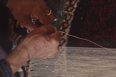 Hands weaving